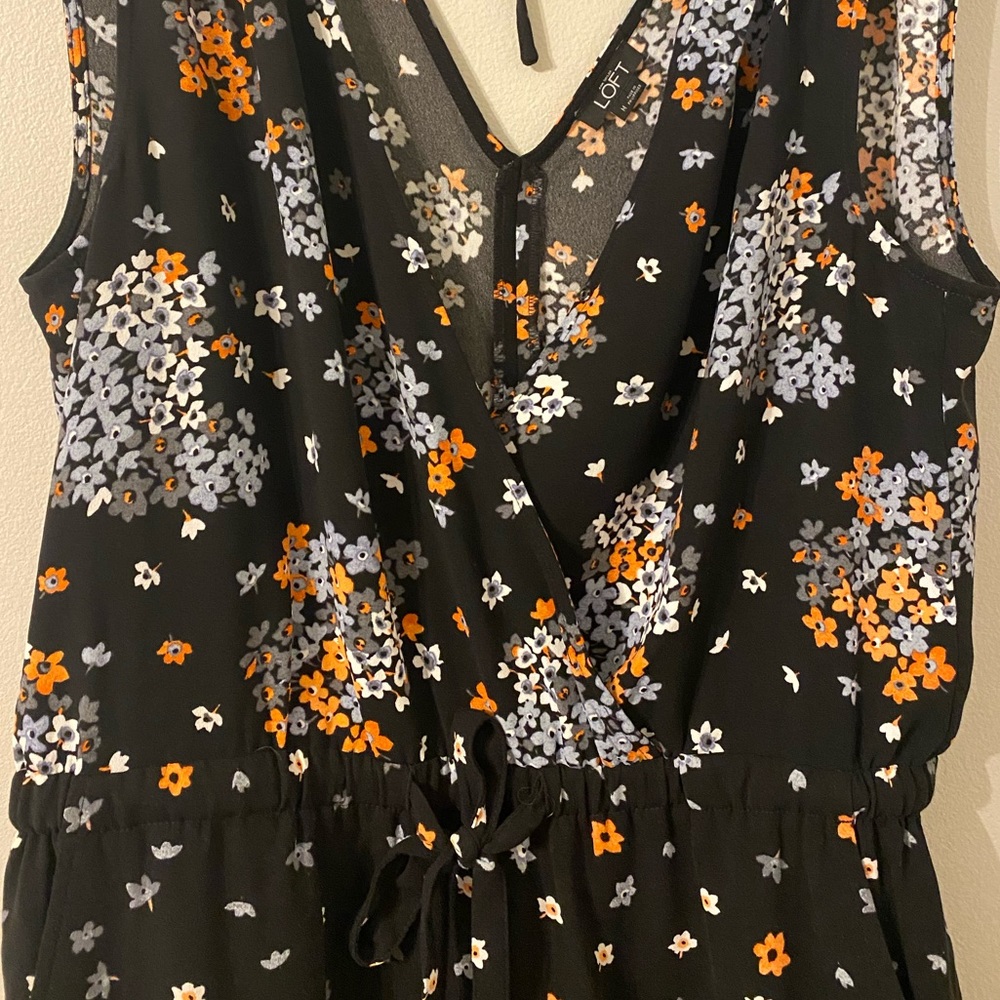 Floral jumpsuit, size medium. I am 5’4’’ for reference.
